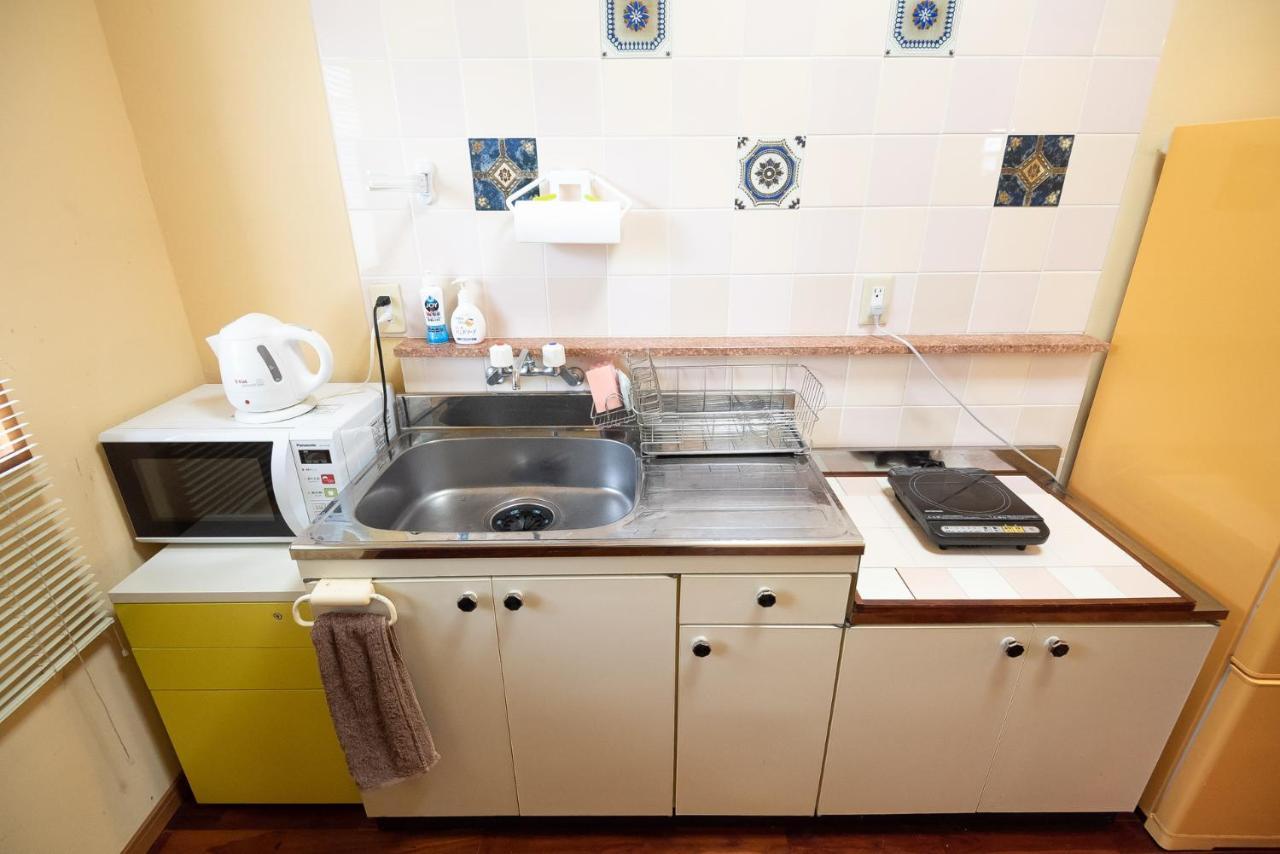 Appartement コテージなかどまり à Onna Extérieur photo
